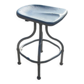 Old metal stool from a factory industrial workshop