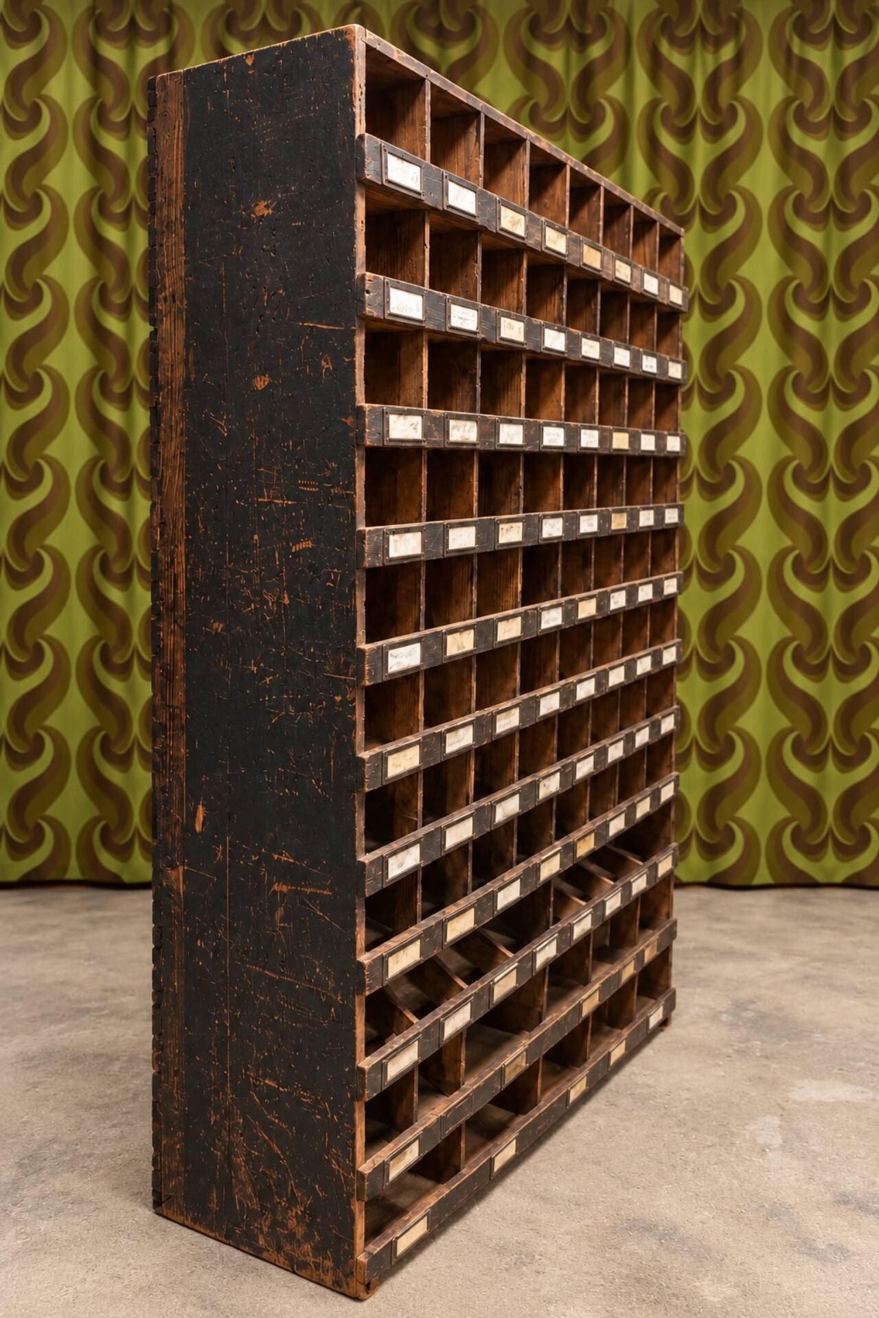Antique workshop furniture in solid fir with numerous compartments.