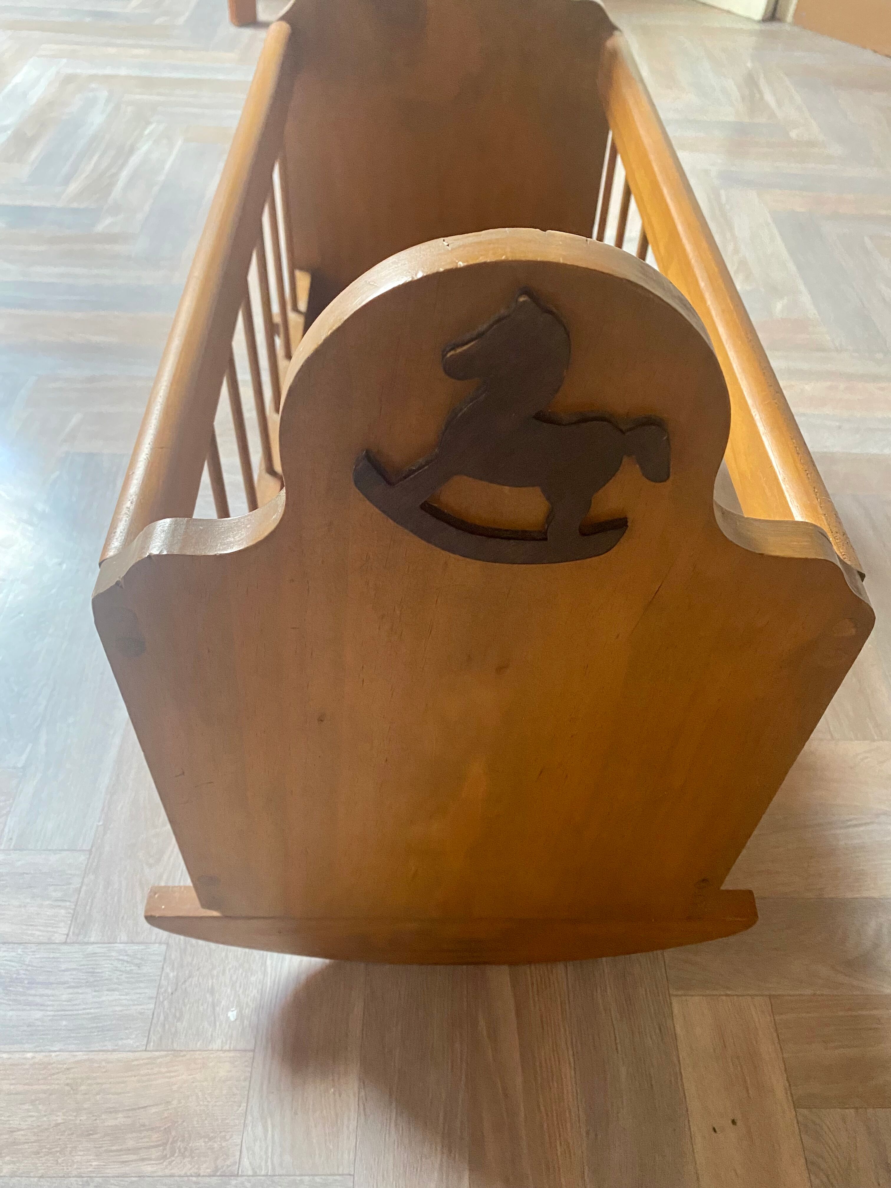 Vintage wooden rocking bed