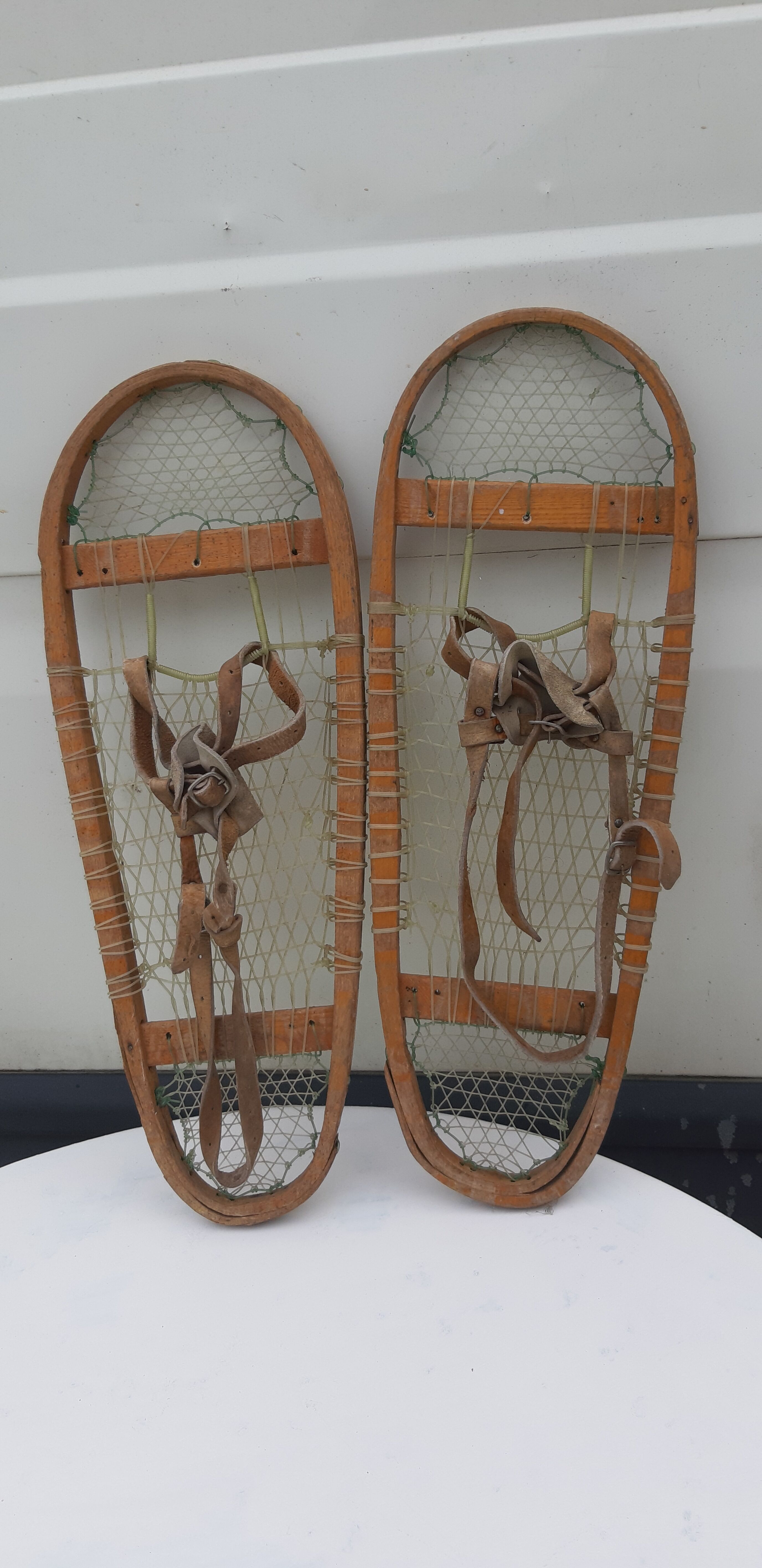 Old snowshoes made of wood and hoses