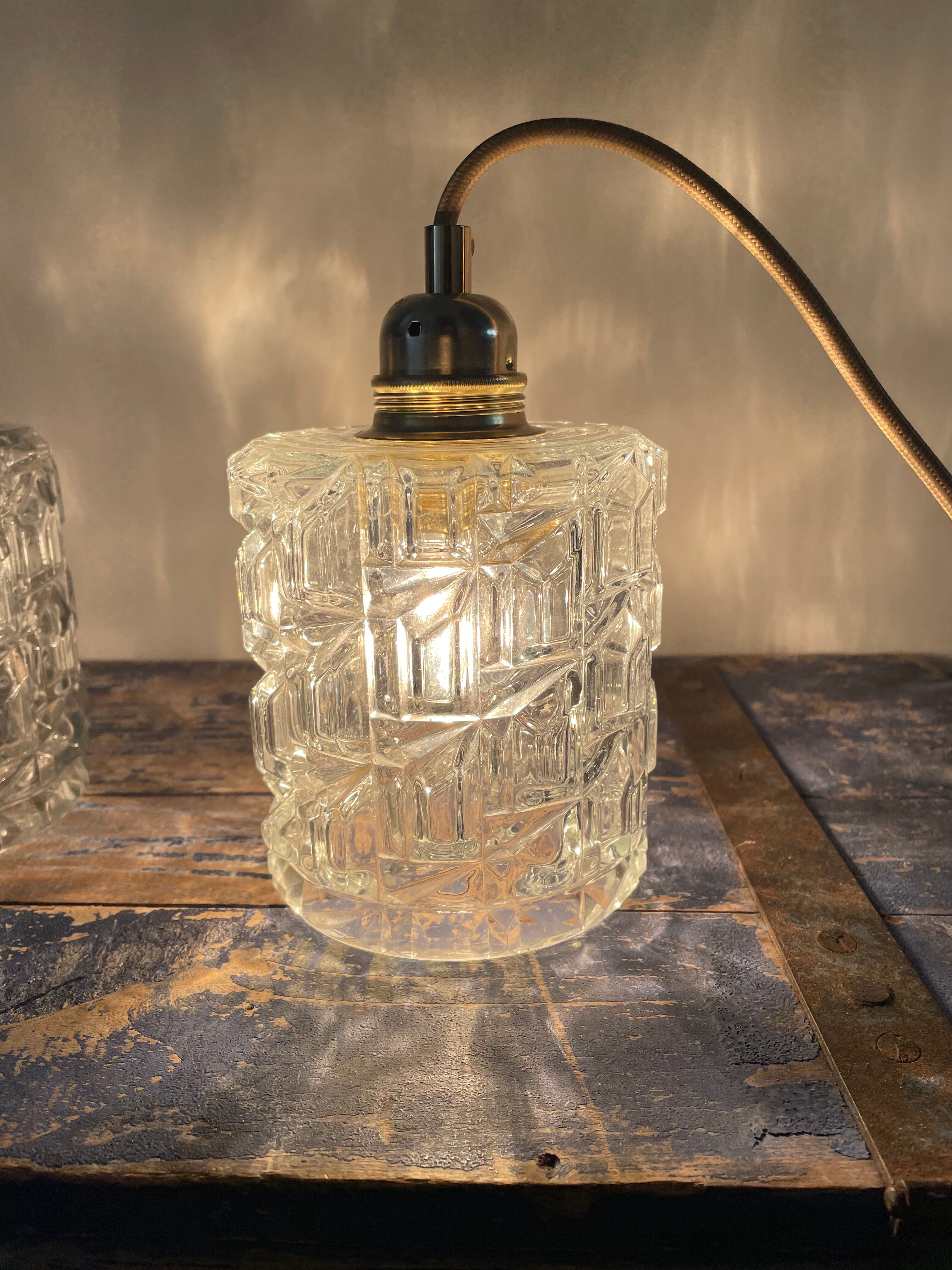 Set of two vintage electric chiseled glass walking lamps