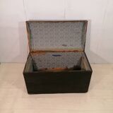 Large travel trunk in blackened wood