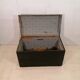 Large travel trunk in blackened wood