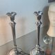 Pair of silver-plated metal candlesticks