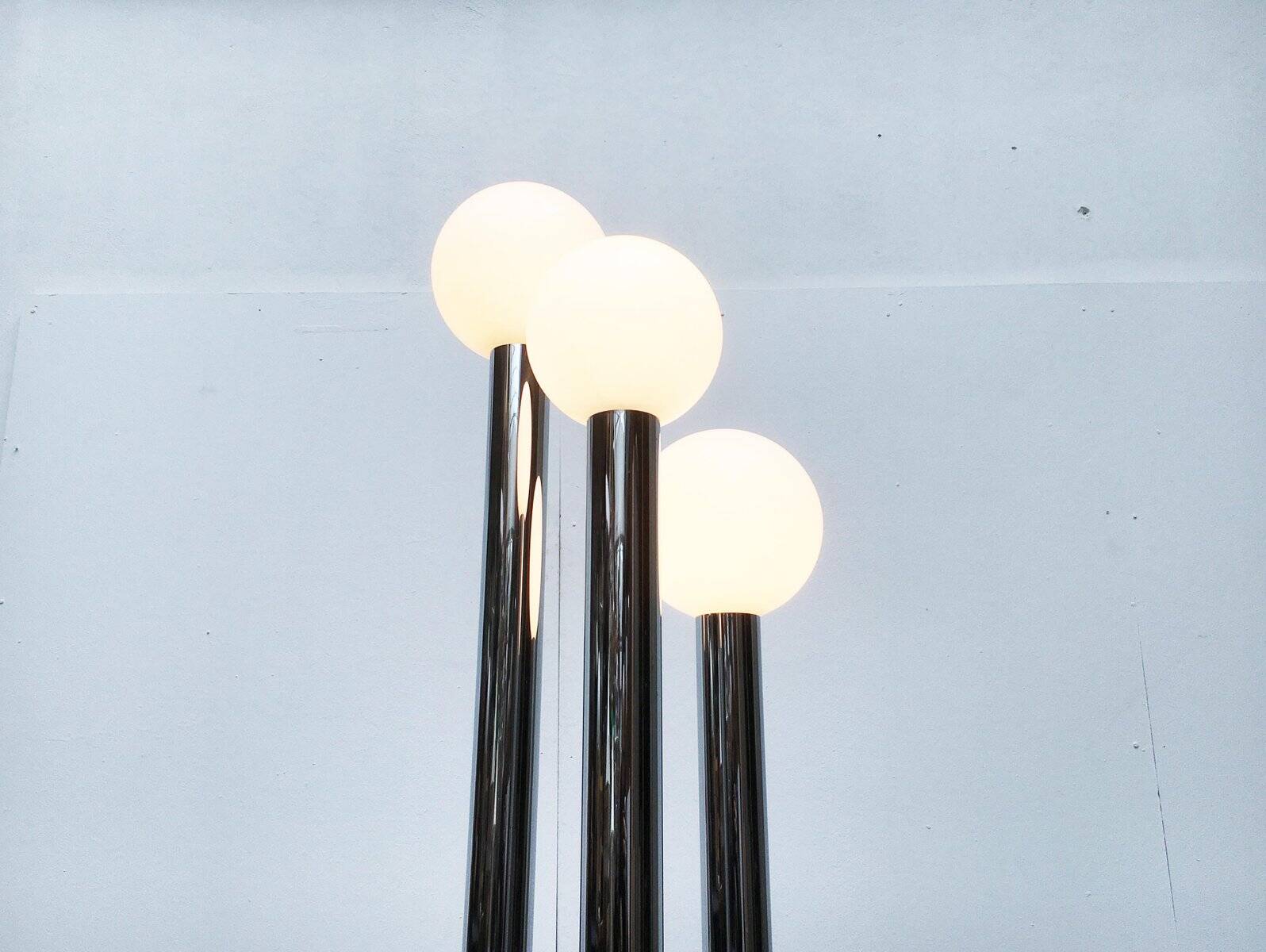 Vintage German floor lamp from the 1970s in glass and metal.