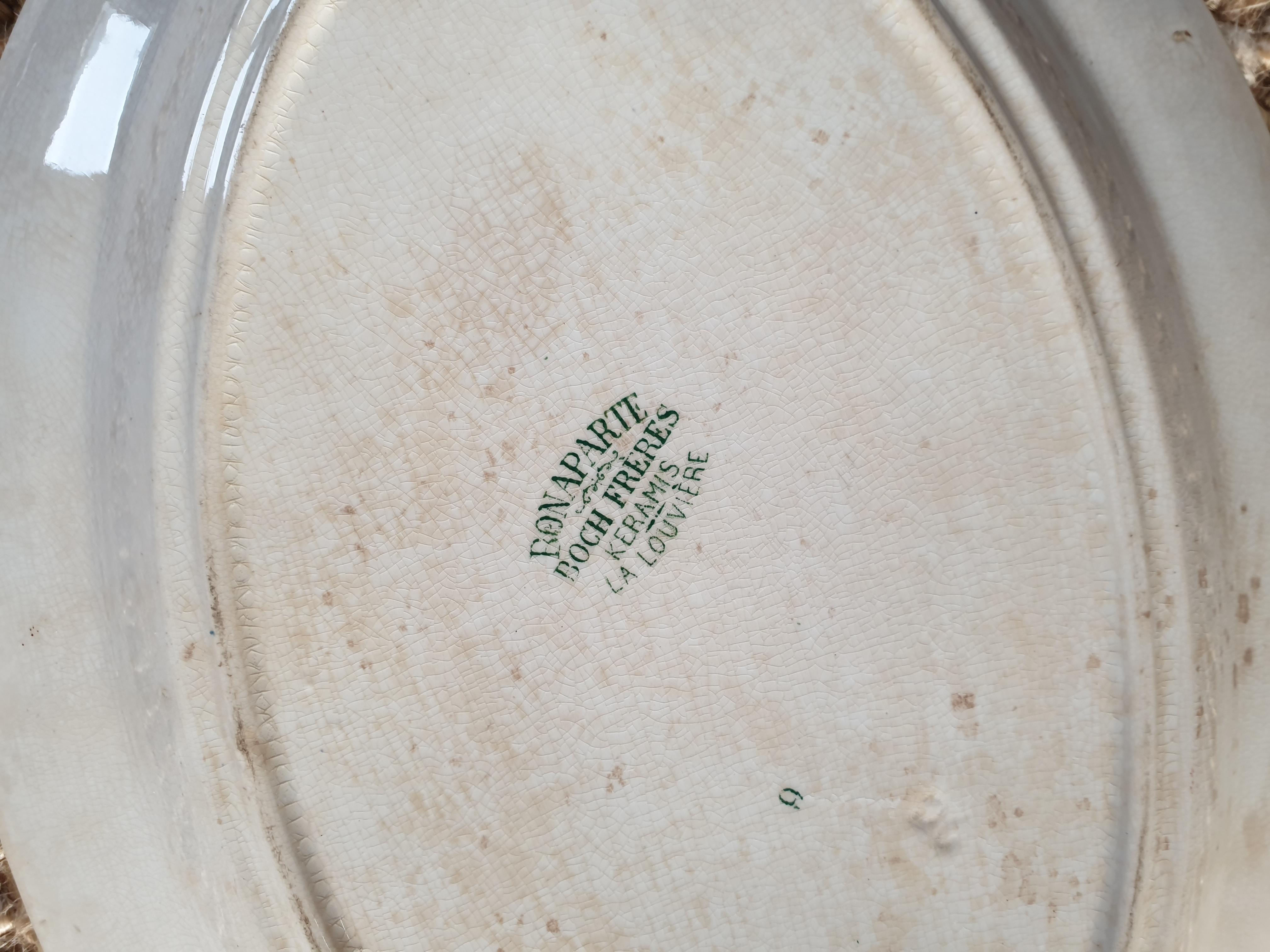 serving plate oval iron earth