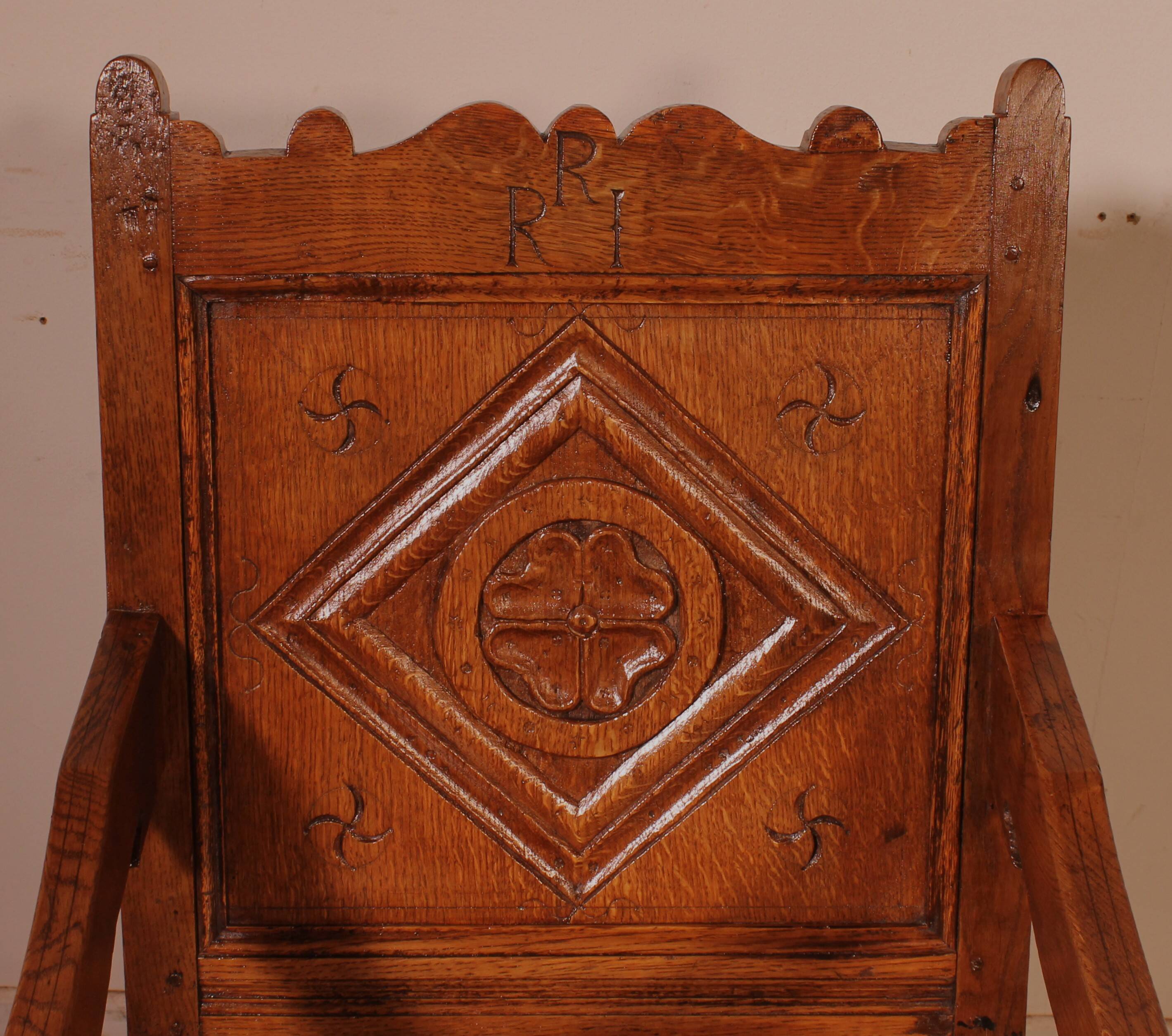high-backed armchair from the 17th century in oak