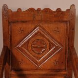 high-backed armchair from the 17th century in oak