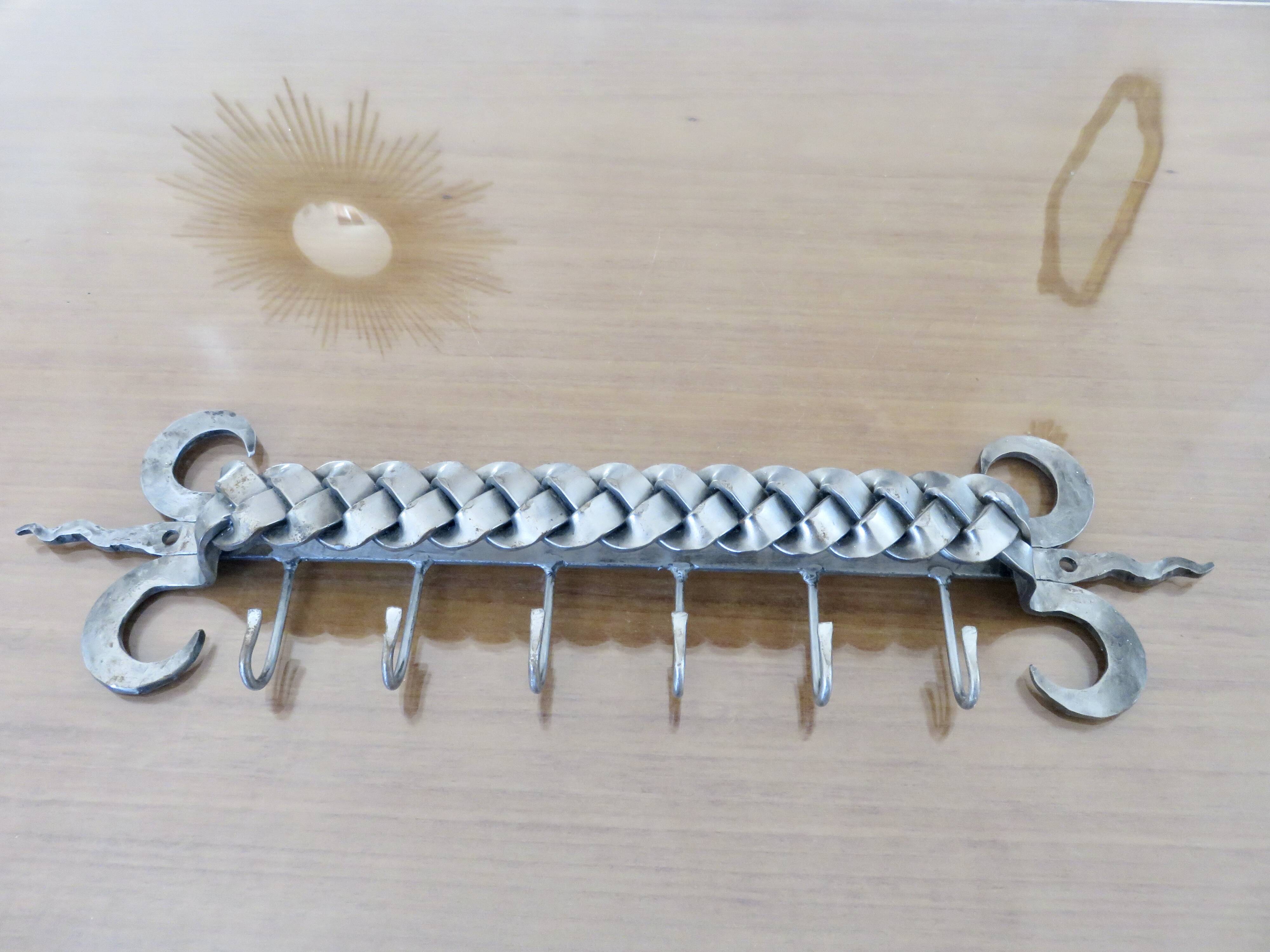 2 Tea towel holders, ironwork in braided raw steel, 1970