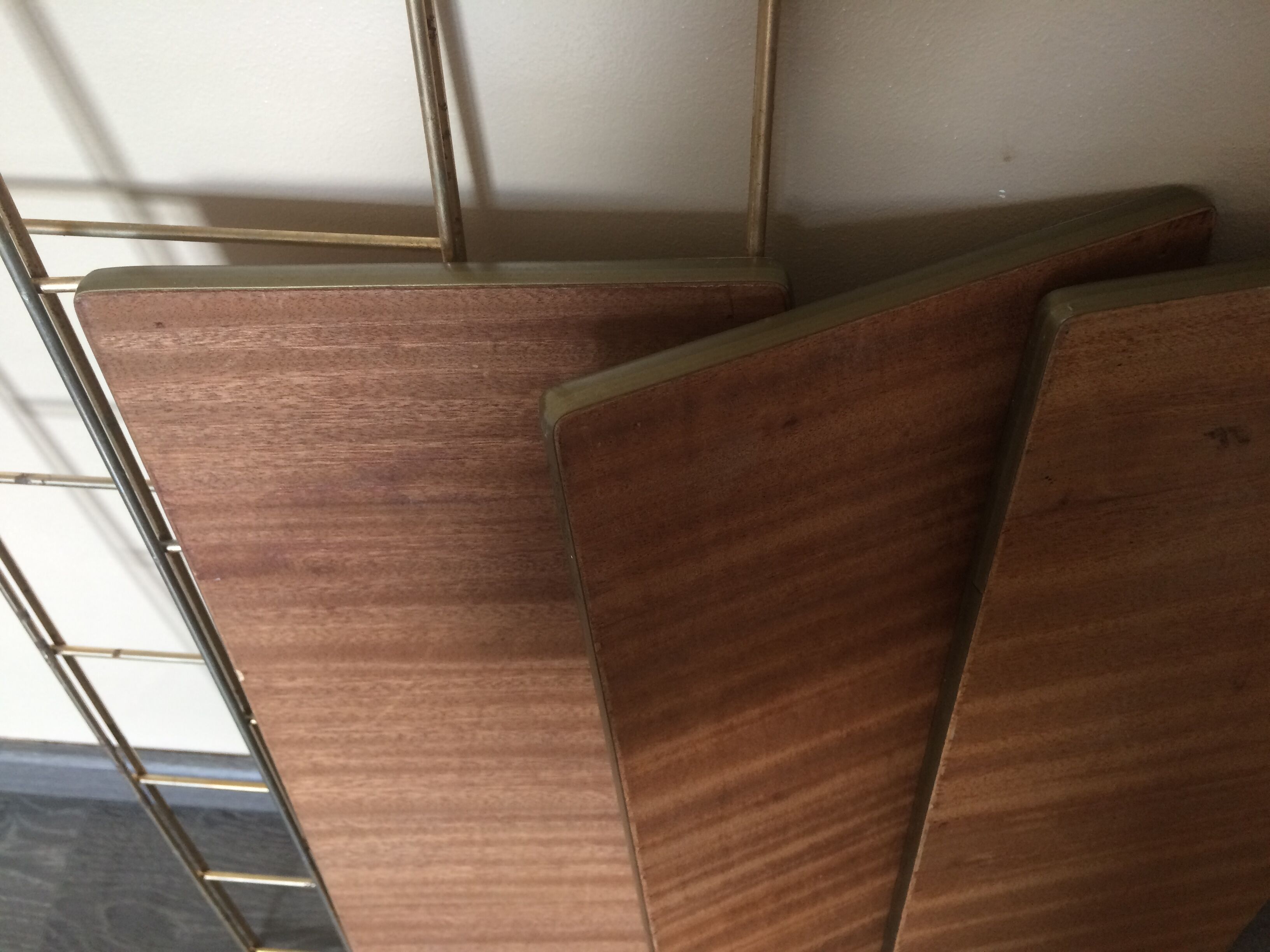 String shelf with wooden trays and formica