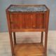 Curtained bedside table from the nineteenth century.