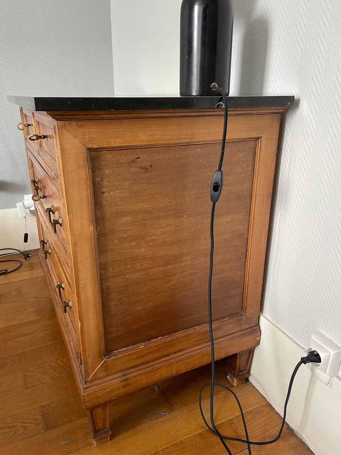 Antique wooden order with black marble top