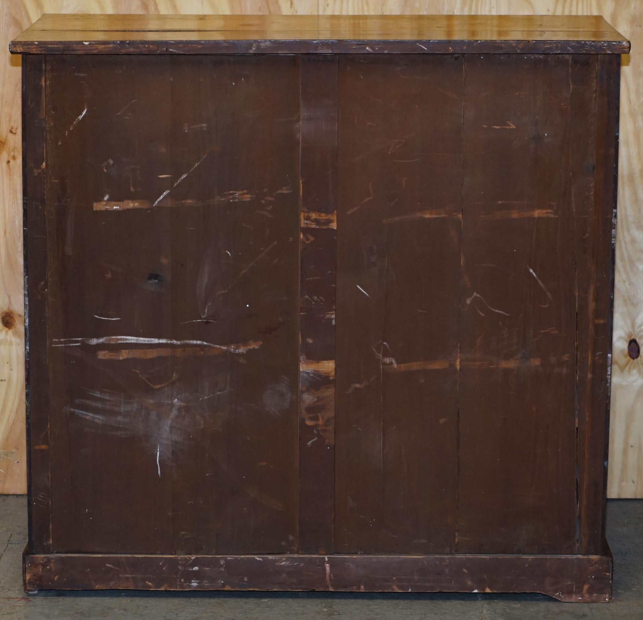 Victorian flamed hardwood commode from the 19th century with a hidden drawer.