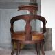Barber chair in wood and leather with adjustable headrest, office chair.