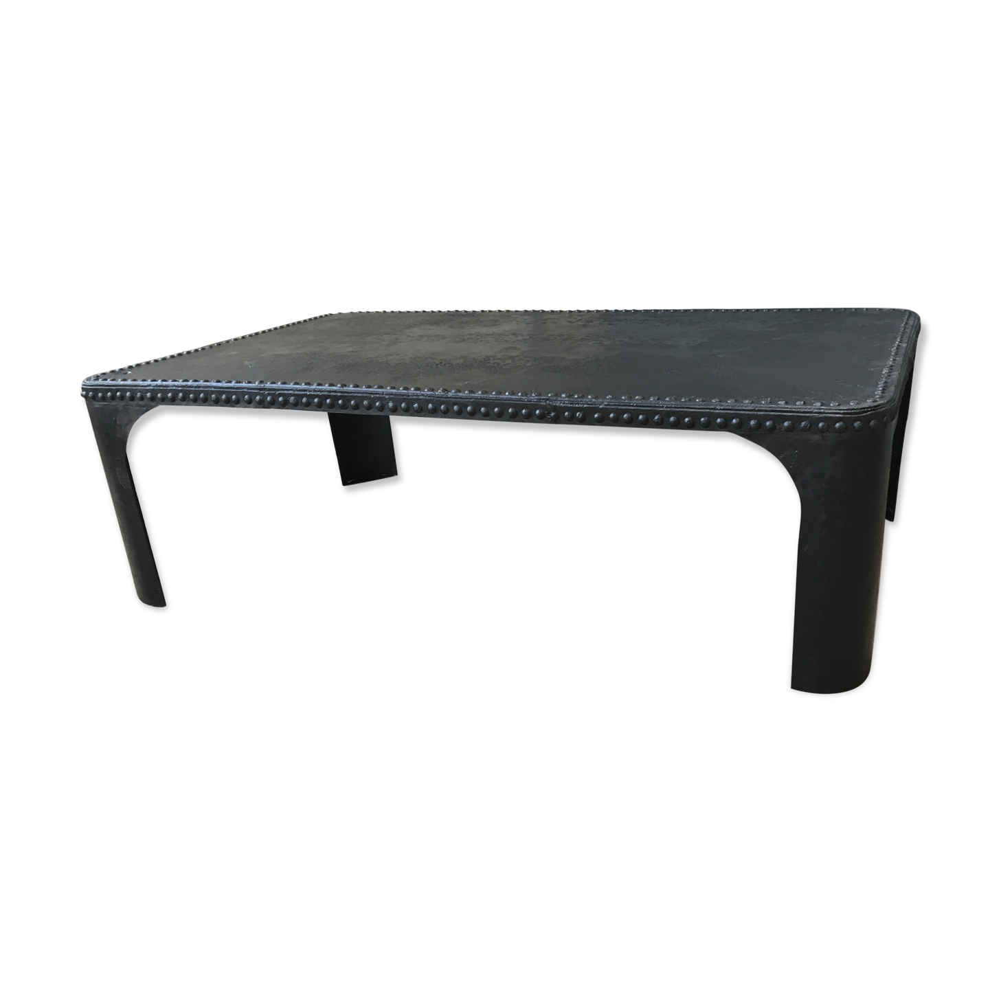 large industrial table in graphite black riveted metal