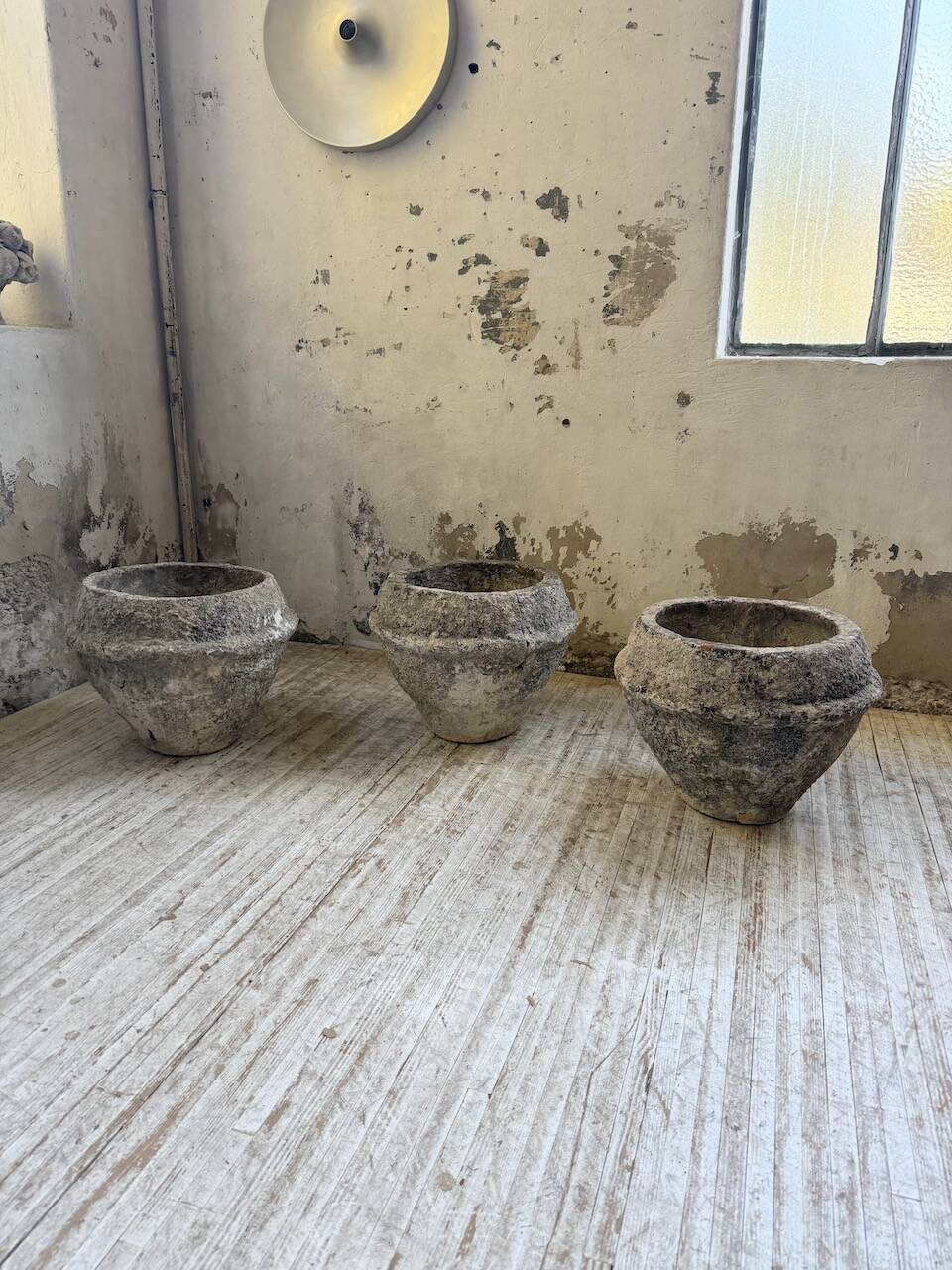 Trio of stone and cement planters, early 1900s