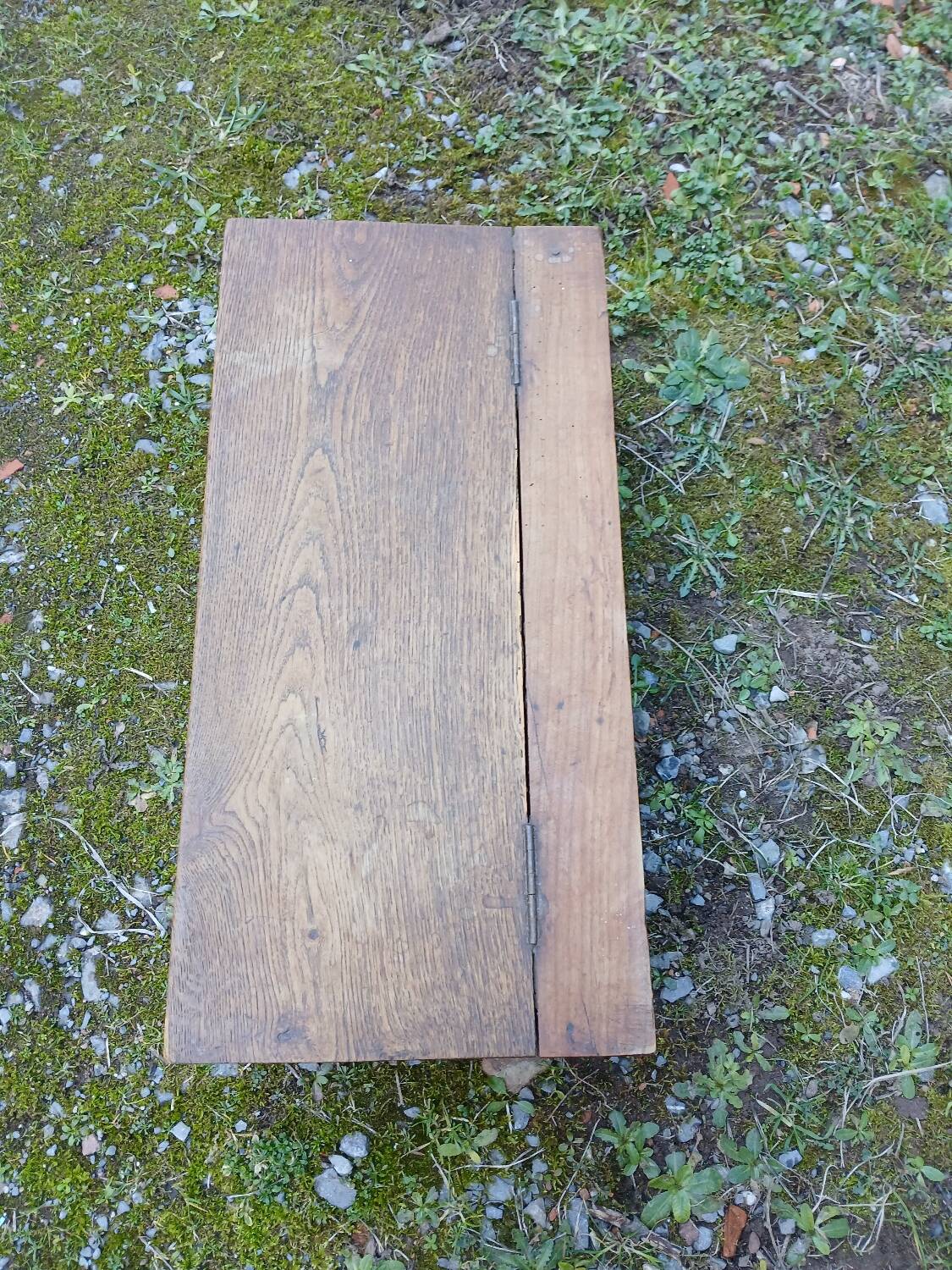 Small old wooden chest with hinged lid