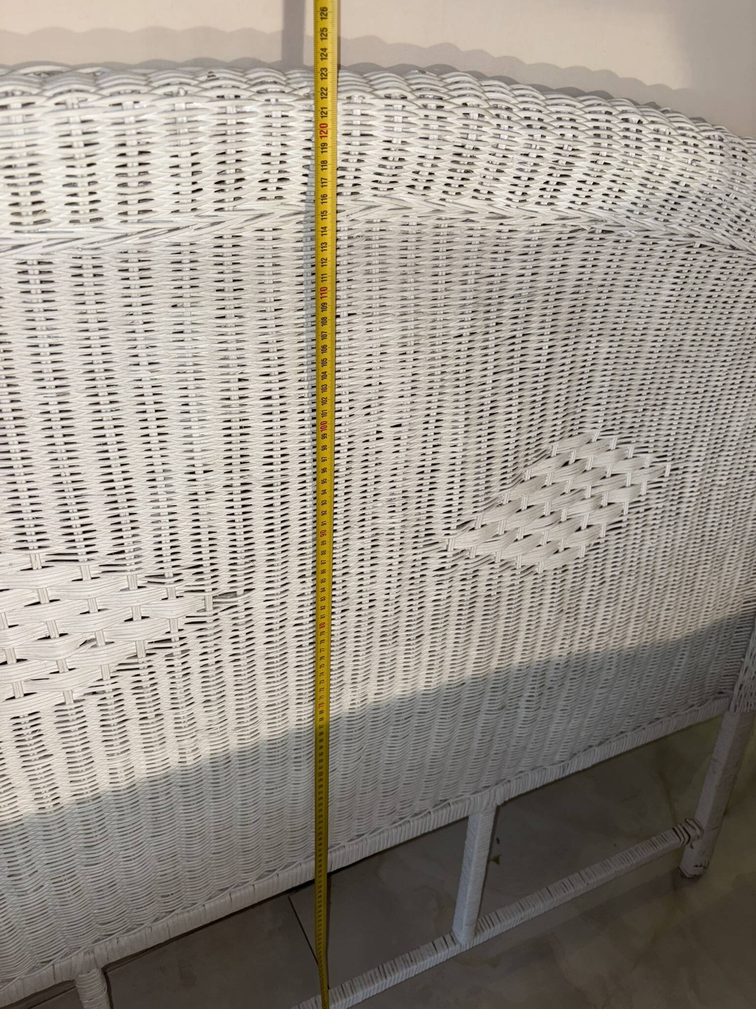 Vintage headboard in woven white rattan