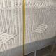 Vintage headboard in woven white rattan