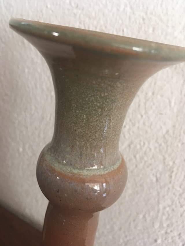 Terracotta candlesticks signed