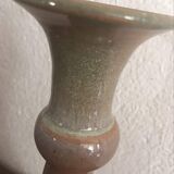 Terracotta candlesticks signed