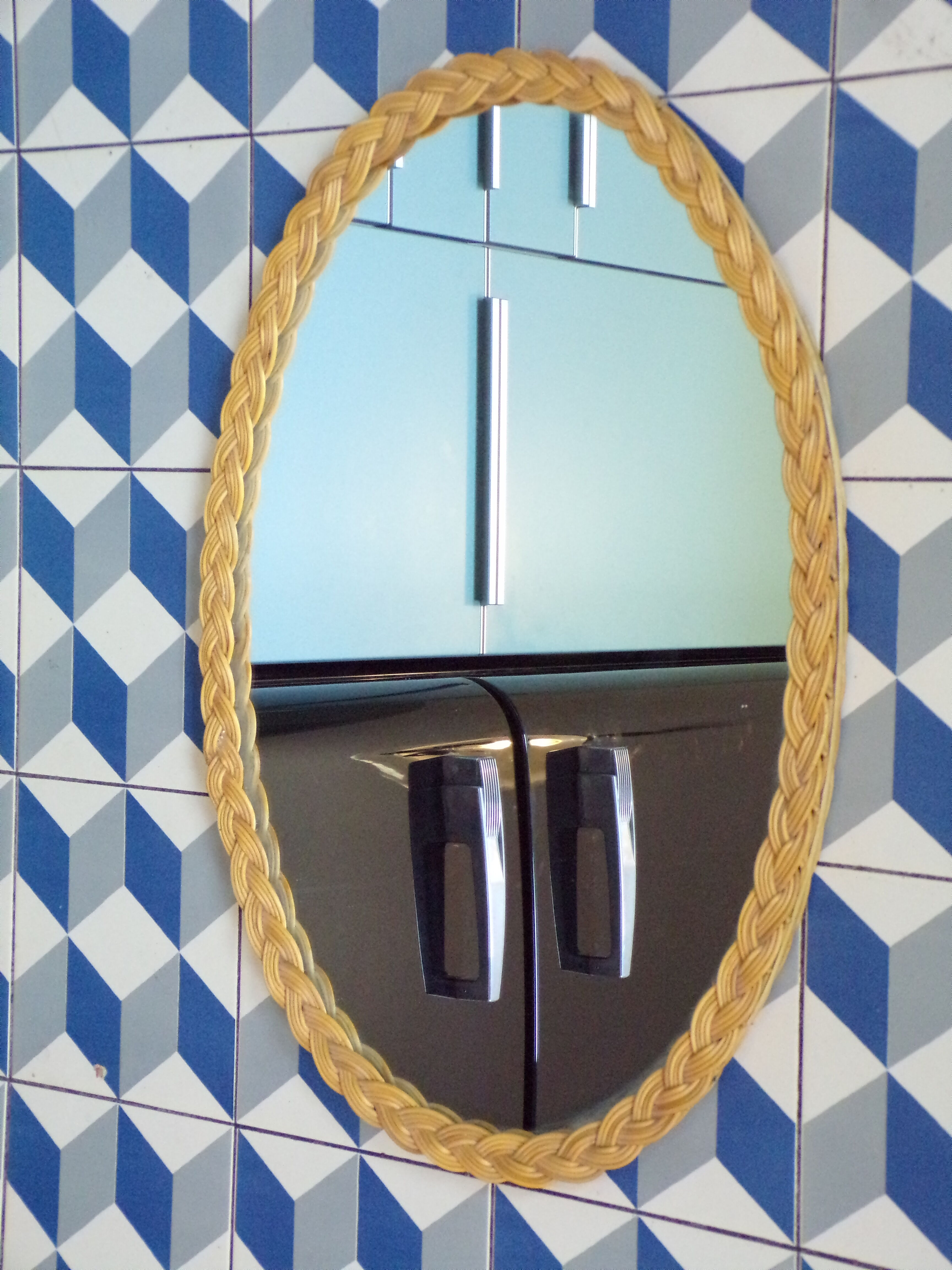 Oval vintage rattan mirror
