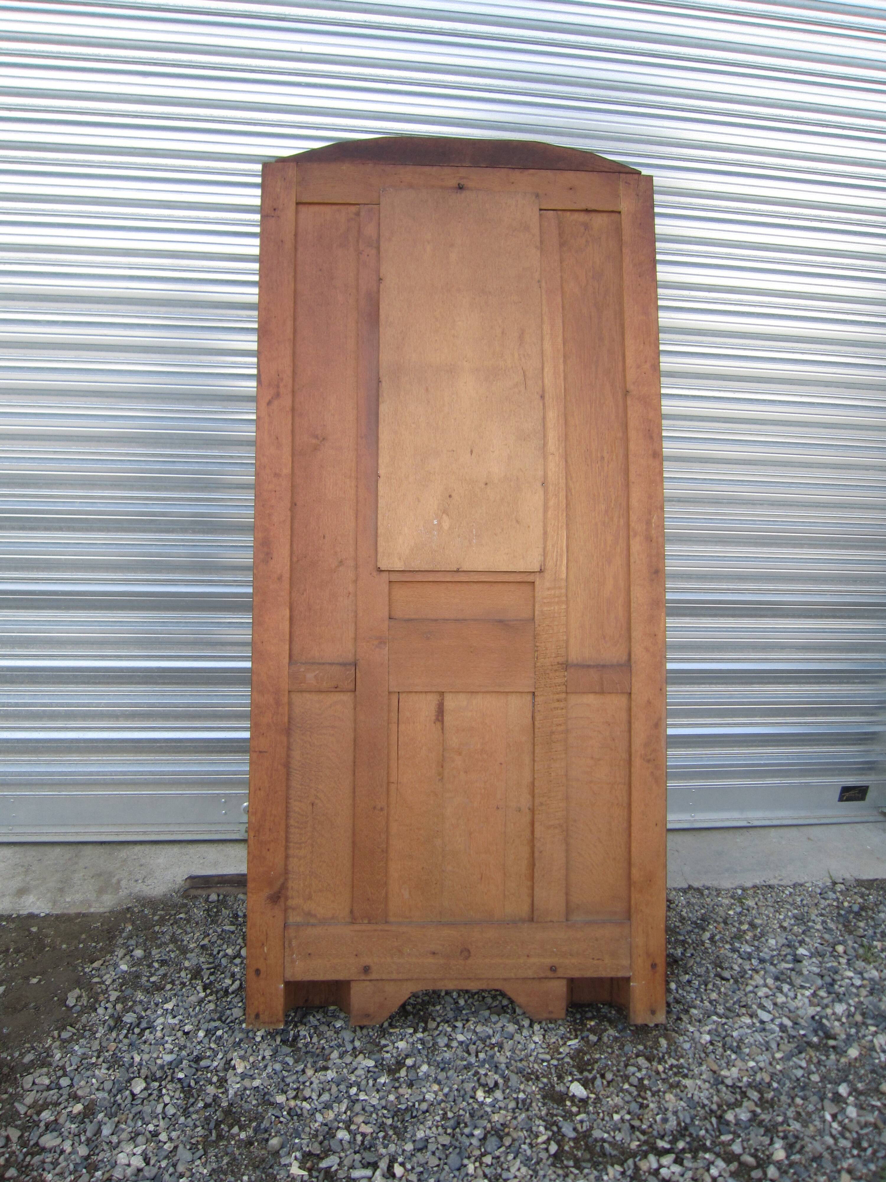 Vestiaire wears hat coat and art deco umbrella in wrought iron patere wood