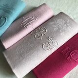 Suite of four antique tinted napkins