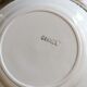 Set of 11 flat earthenware plates