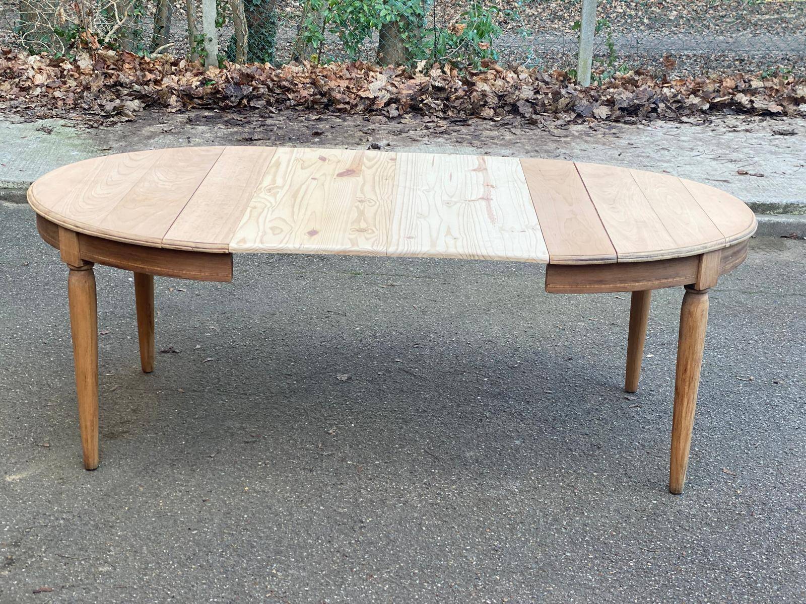 Renovated Louis Philippe round extendable dining table from the 18th century, 205cm.