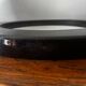 Vintage round mirror from the 70s, smoked brown plastic