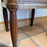 Antique bedside table in wood and marble – adorned with gilded brass ornaments –