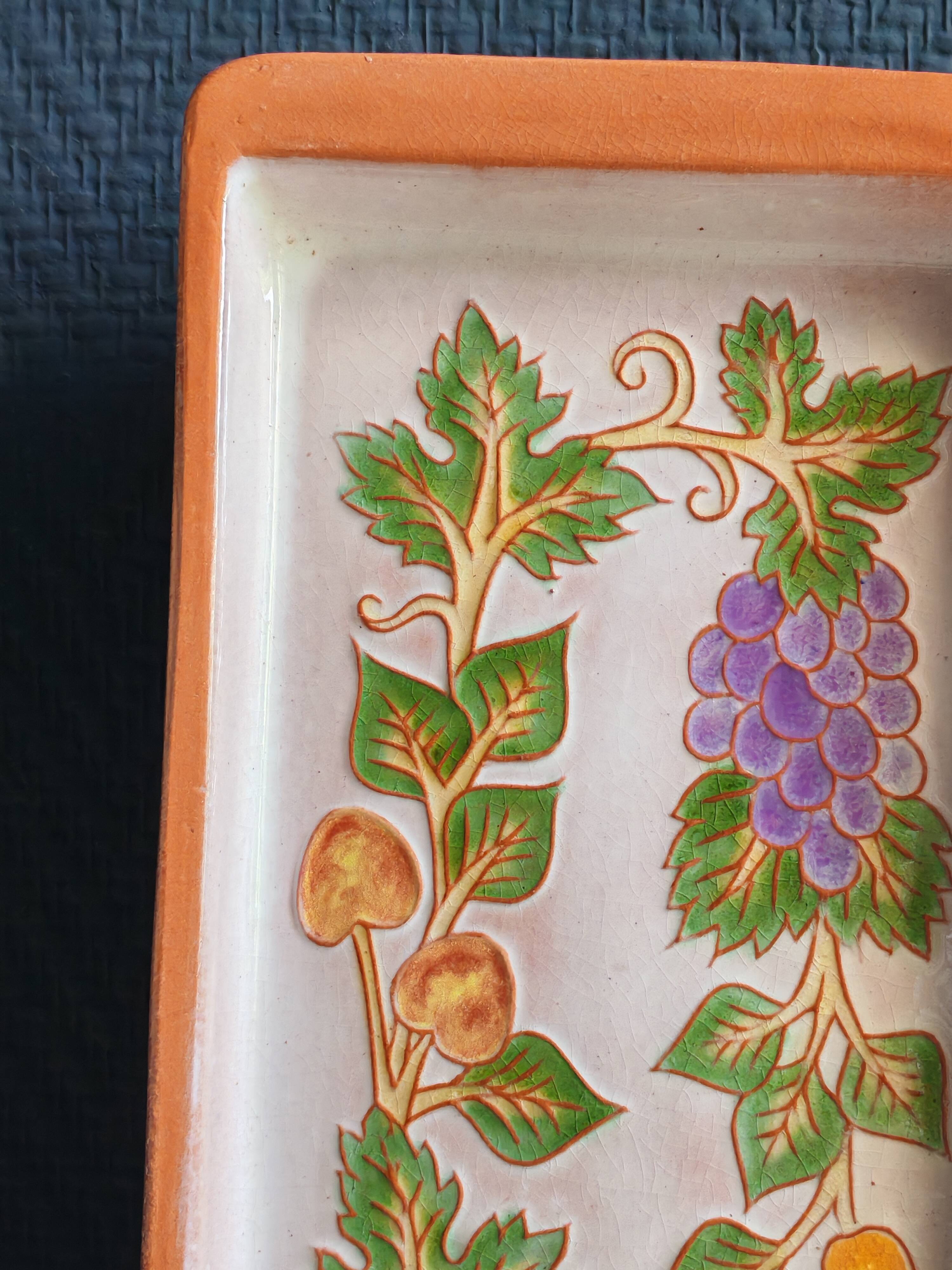 Terracotta plate signed P.Boy, glazed artisanal ceramics.