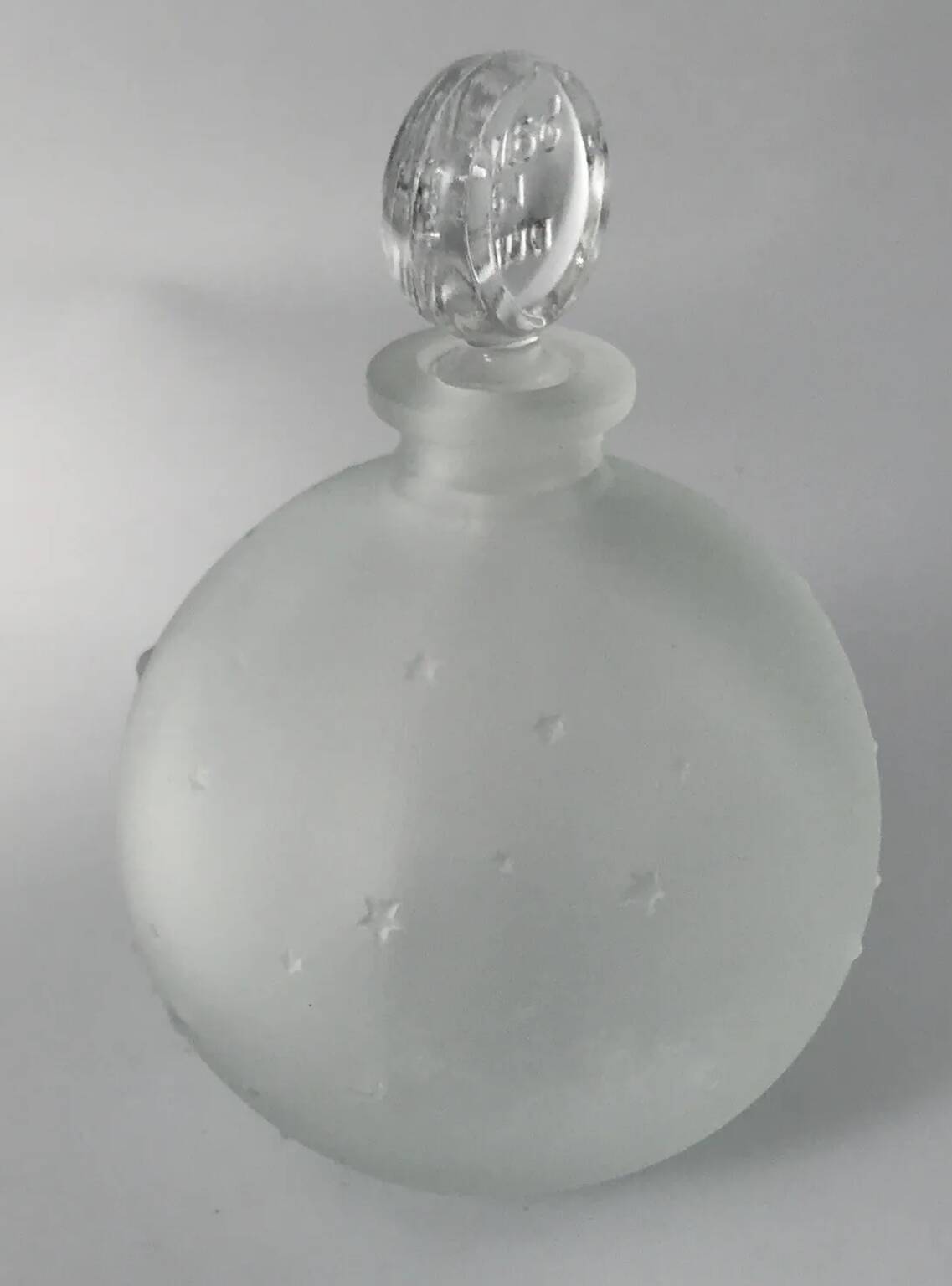 Lalique bottle in the night, frosted glass, ball shape