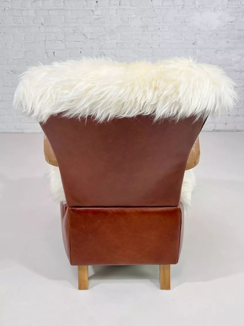 Scandinavian style armchair in leather and hide