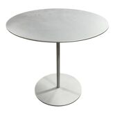 Round grey aluminium coffee table by Cassina.