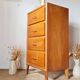 Commode vintage années 50 en bois – 4 tiroirs – pieds compas