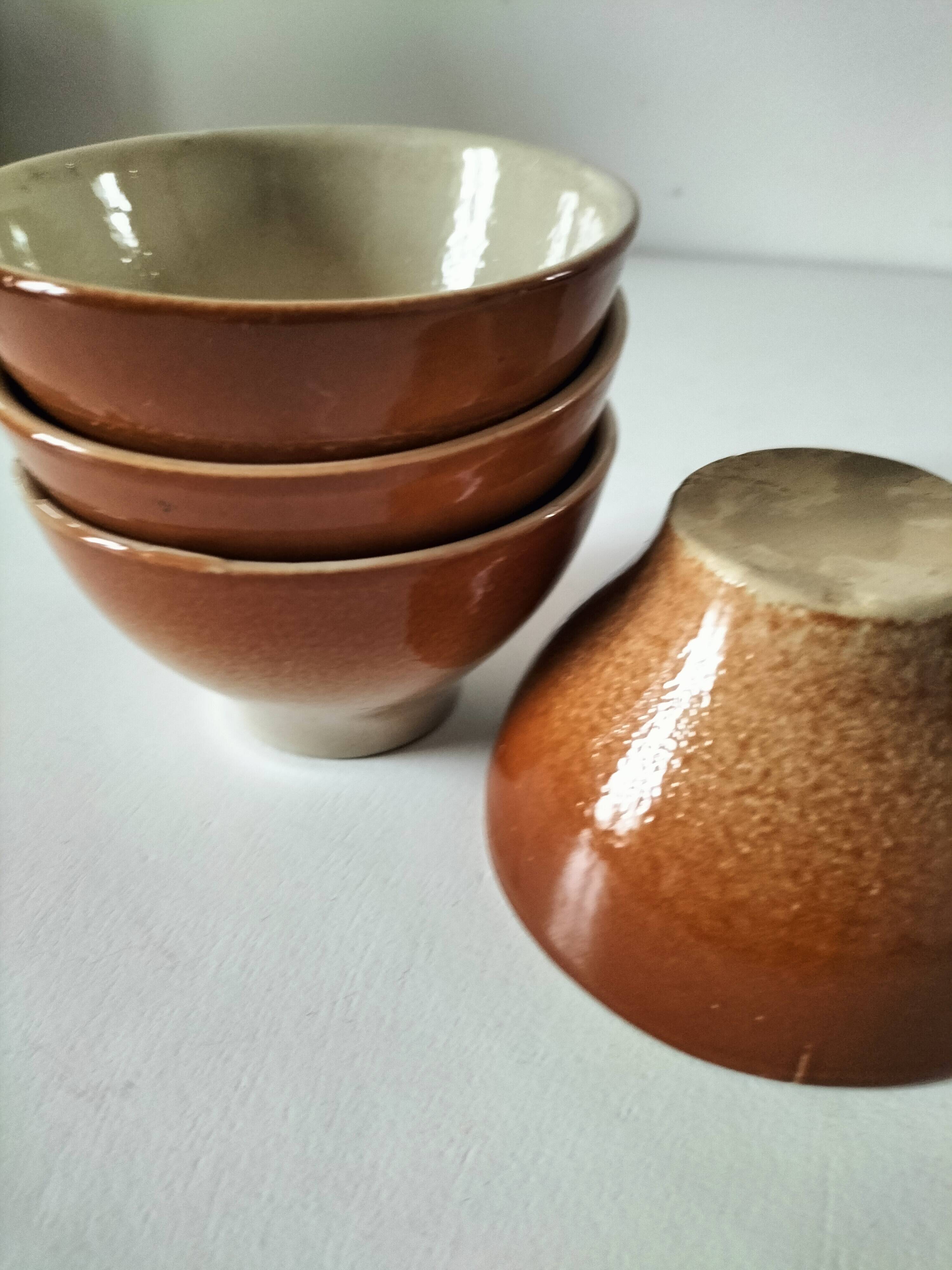 Set of 4 small glazed earthenware bowls
