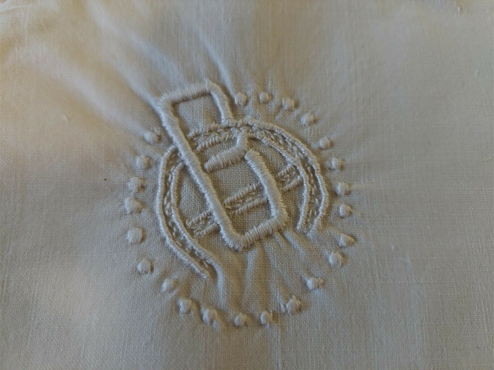 White cotton cushion or pillow case embroidered monogram and ruffle