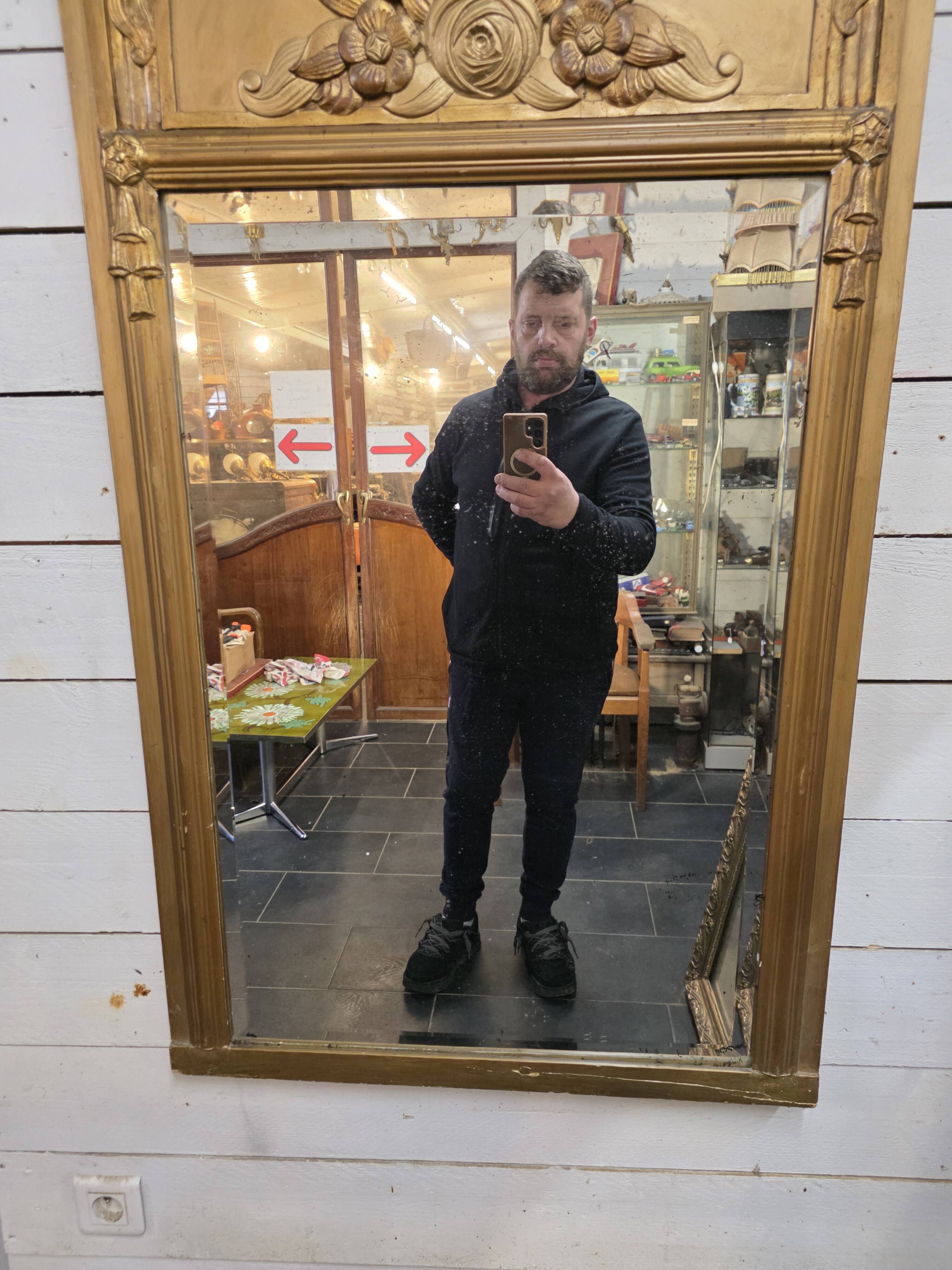 Art Deco gilded trumeau, bevelled mirror