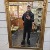 Art Deco gilded trumeau, bevelled mirror