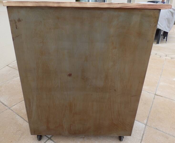 Old industrial furniture in rusty effect metal with two drawers on casters
