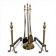 Pair of fire dogs and fireplace tools