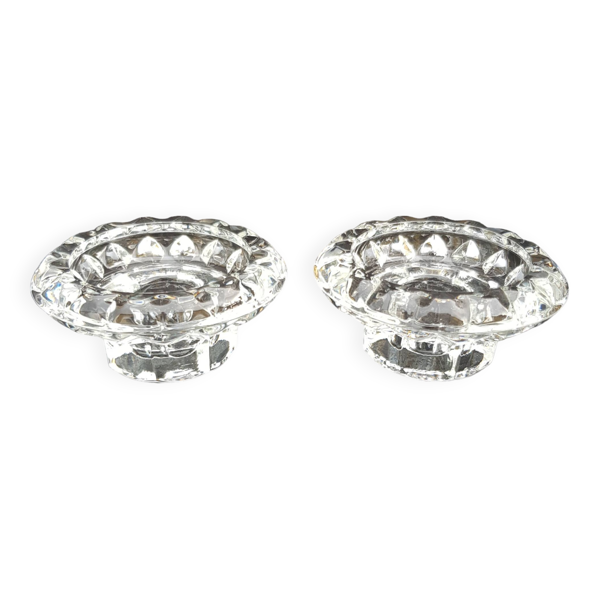 Duo of old glass candlesticks