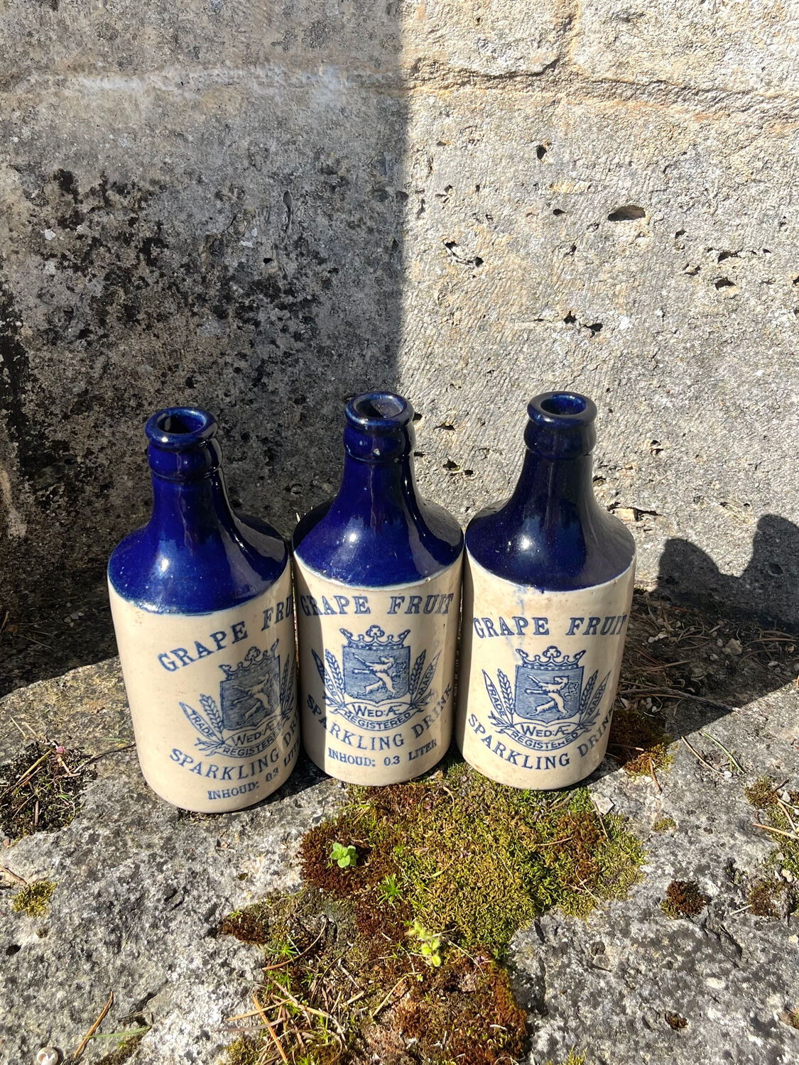 French stoneware grapefruit sparkling drink bottles