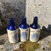 Bouteilles de boisson pétillante au pamplemousse en grès français