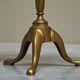 Antique wooden and brass side table, 19th century.