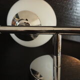 Pair of sconces with an opaline globe and chrome structure from the 1970s