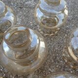 Set of 6 amber glass globes.