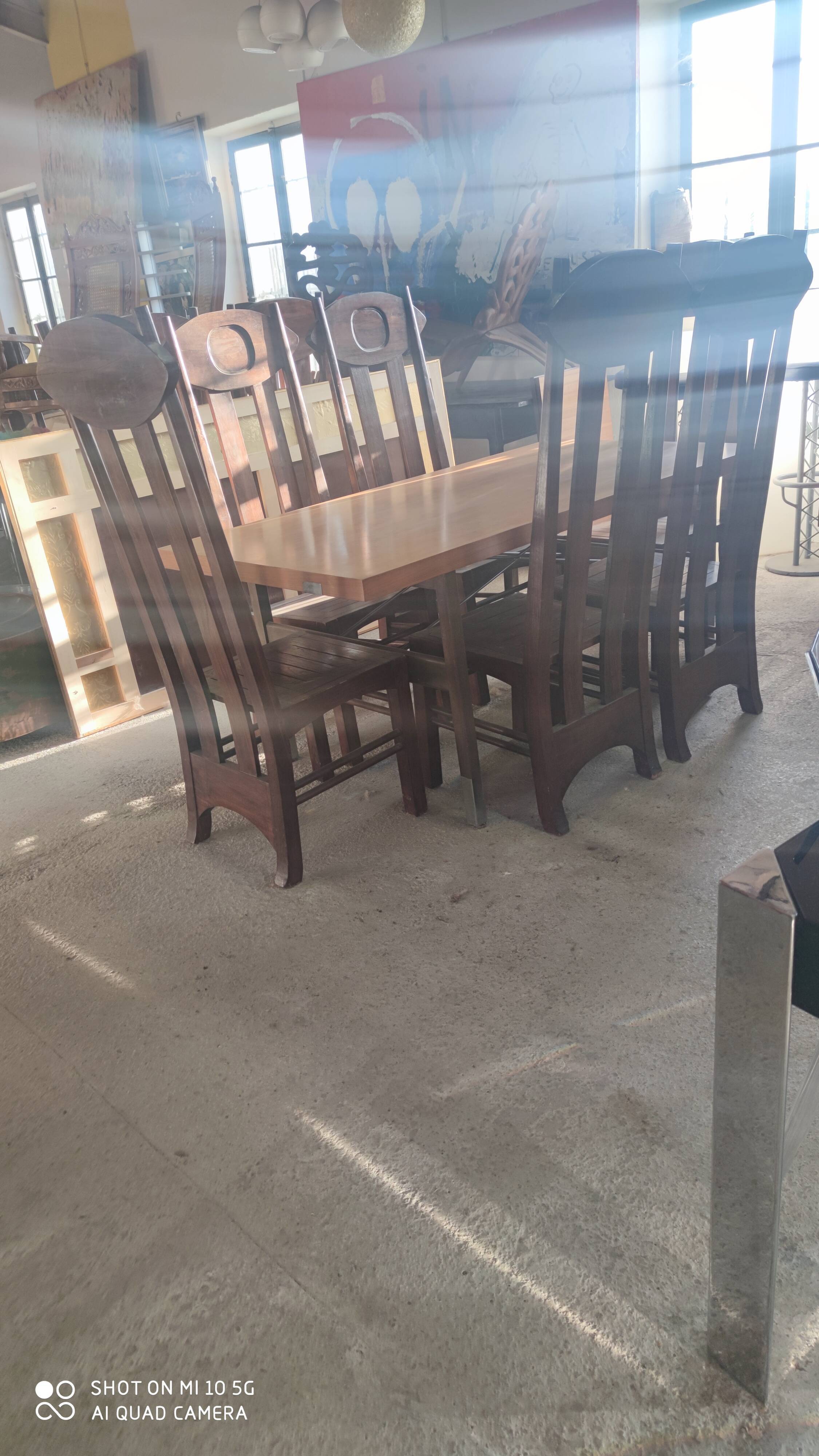 Extendable dining table in walnut, mahogany and chrome, circa 1960
